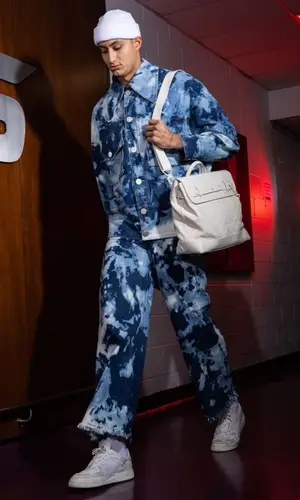 Kyle Kuzma wearing Angel Chen jeans