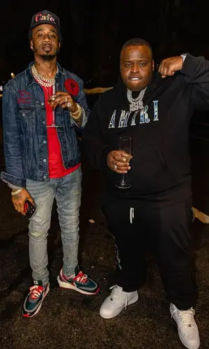 Morray wearing Nike sneakers