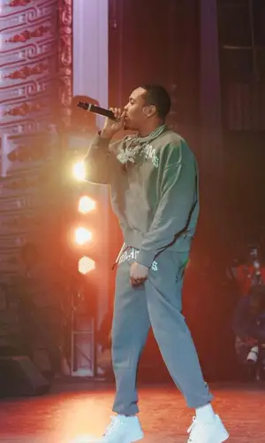 G Herbo wearing Palm Angels sweatshirt