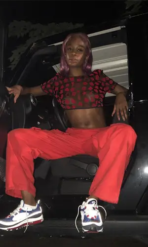 Abra wearing Walter van Beirendonck top