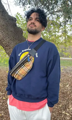 Aries wearing Vintage sweater