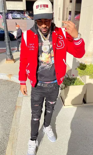 Ron Suno wearing Gifts of Fortune cap