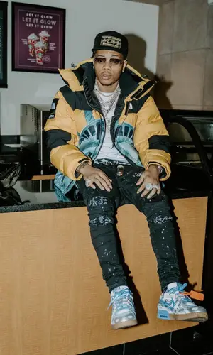 Lil Migo wearing Chrome Hearts cap