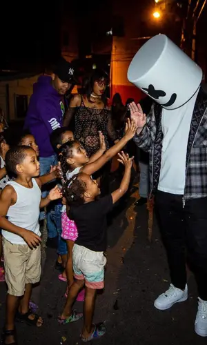 Marshmello wearing Nike sneakers