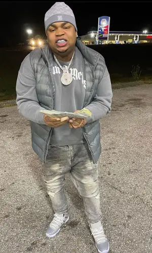 Big Yavo wearing Louis Vuitton hat