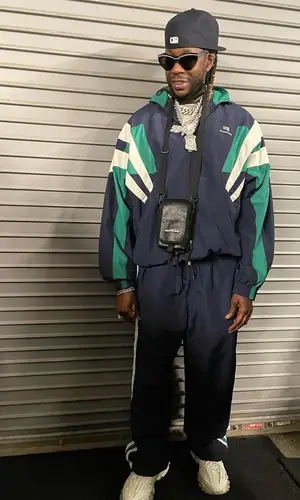 2 Chainz wearing Balenciaga wallet