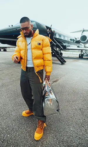 Maluma’s Outfit in Needles Pants, Louis Vuitton Bag & Carrera Eyewear (2021)