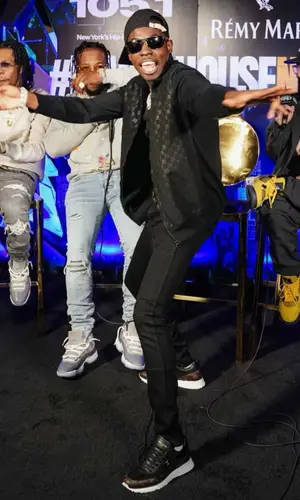Rowdy Rebel’s Outfit in Gallery Dept. Hoodie, Amiri Jeans & Jordan Sneakers (2021)