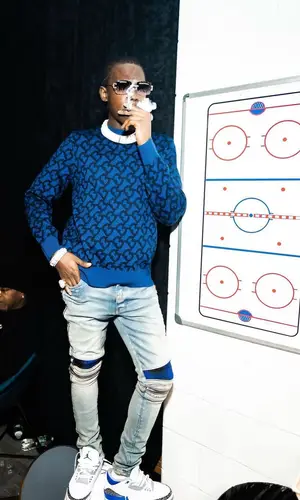 Bobby Shmurda wearing Louis Vuitton belt