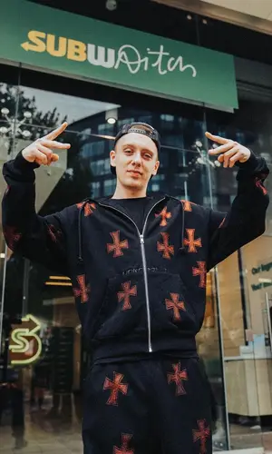 Aitch wearing Unknown London pants