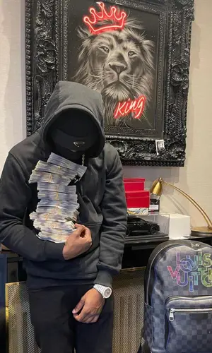 Lil Tjay wearing Moncler jacket