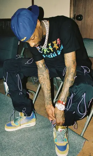 Sonny Digital wearing 99percentis pants