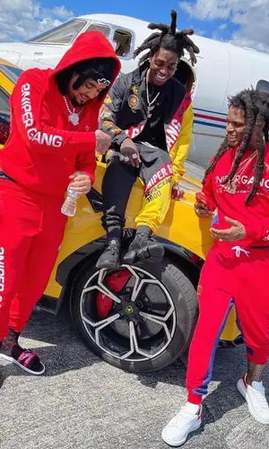 Kodak Black wearing Louis Vuitton bag