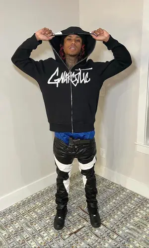 Lil Gnar wearing Rhude pants