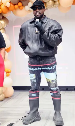 Kanye West wearing Kanye West Merch cap