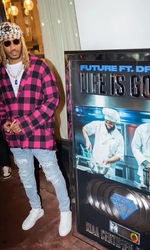 Future wearing Palm Angels shirt