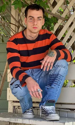 Global Dan wearing Problem6oy jeans