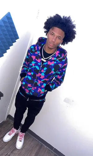 Mikey wearing Bape hoody