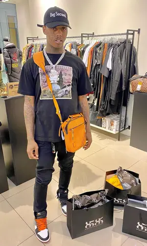 Famous Dex wearing Tote N Carry bag
