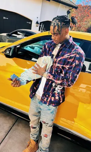 Soulja Boy wearing FashionNova t-shirt