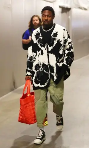 Stefon Diggs wearing Loewe jacket