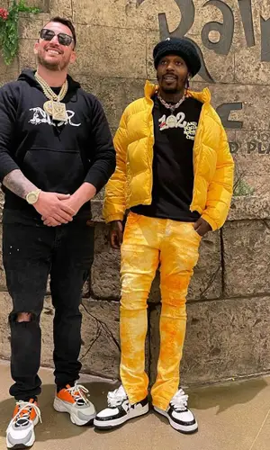 Sauce Walka wearing Global Currency cap