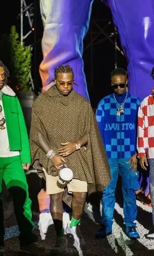 21 Savage wearing Louis Vuitton pants