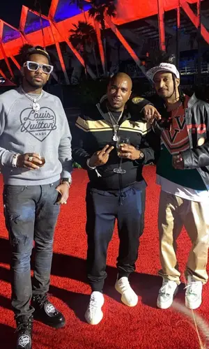 Fabolous wearing Louis Vuitton boots