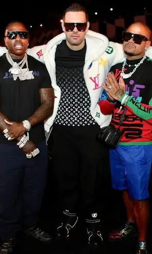 BandMan Kevo wearing Louis Vuitton pants