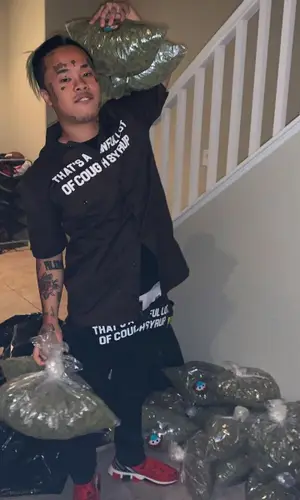 Kid Trunks wearing Cough Syrup pants