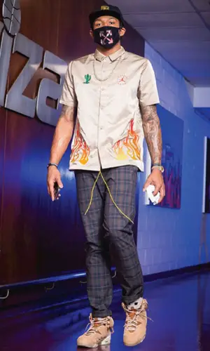 Bradley Beal wearing Christos pants