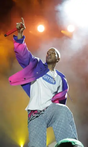 Kid Cudi’s Outfit in Louis Vuitton Jacket & Polite Worldwide Jewelry (2021)