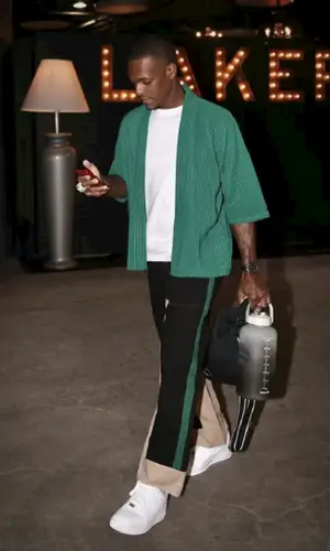Rajon Rondo wearing Homme shirt