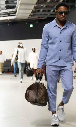 Ugo Amadi wearing Nike sneakers