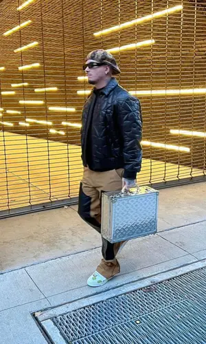 J Balvin wearing Louis Vuitton hat