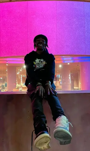 Dro Kenji wearing Balenciaga hat