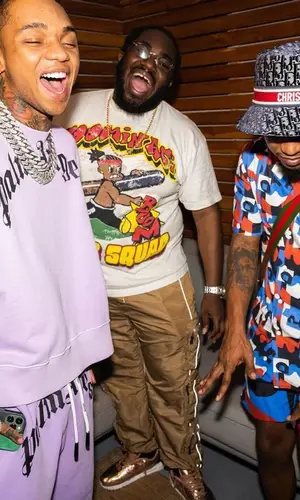 Slim Jxmmi wearing Dior hat