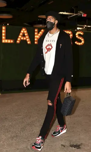Anthony Davis wearing Amiri pants