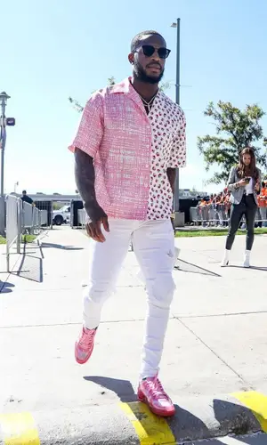 Kareem Jackson wearing Prada shirt