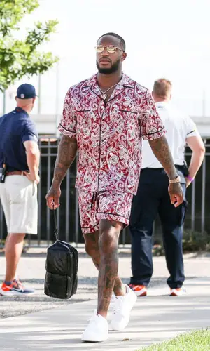Kareem Jackson wearing Amiri shirt