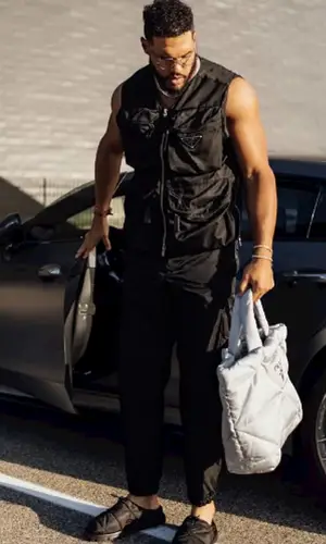 Anthony Barr wearing Prada jacket