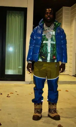EST Gee wearing Palm Angels hat