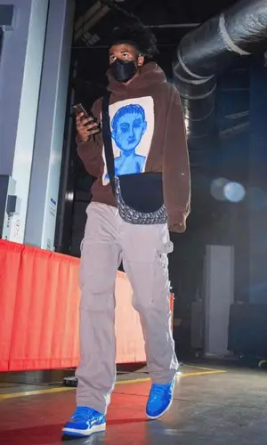 Jalen Green wearing Dior bag