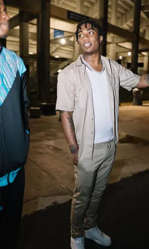Fredo Bang wearing Dickies shirt