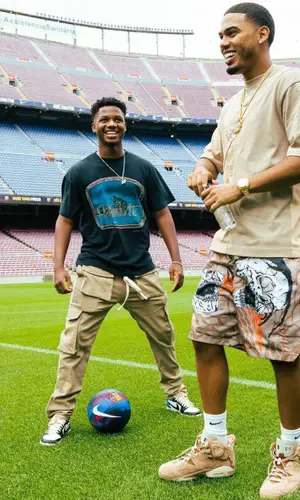 Myke Towers wearing Nike sock