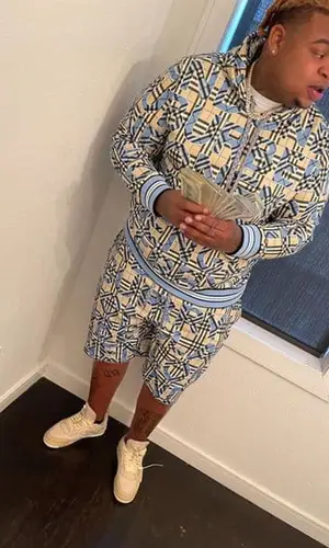 Big Yavo wearing Burberry hoody
