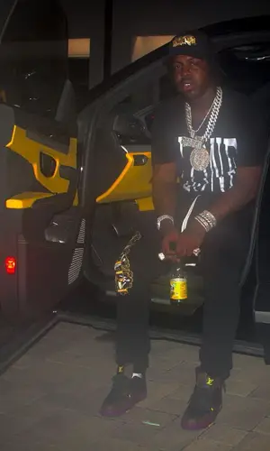 EST Gee wearing Amiri hat