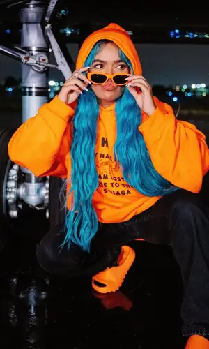 Karol G wearing Balenciaga hoody