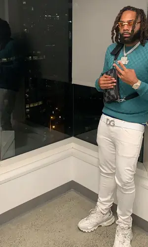 Money Man wearing Louis Vuitton sweatshirt