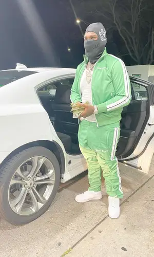 Fat Boy wearing Palm Angels jacket